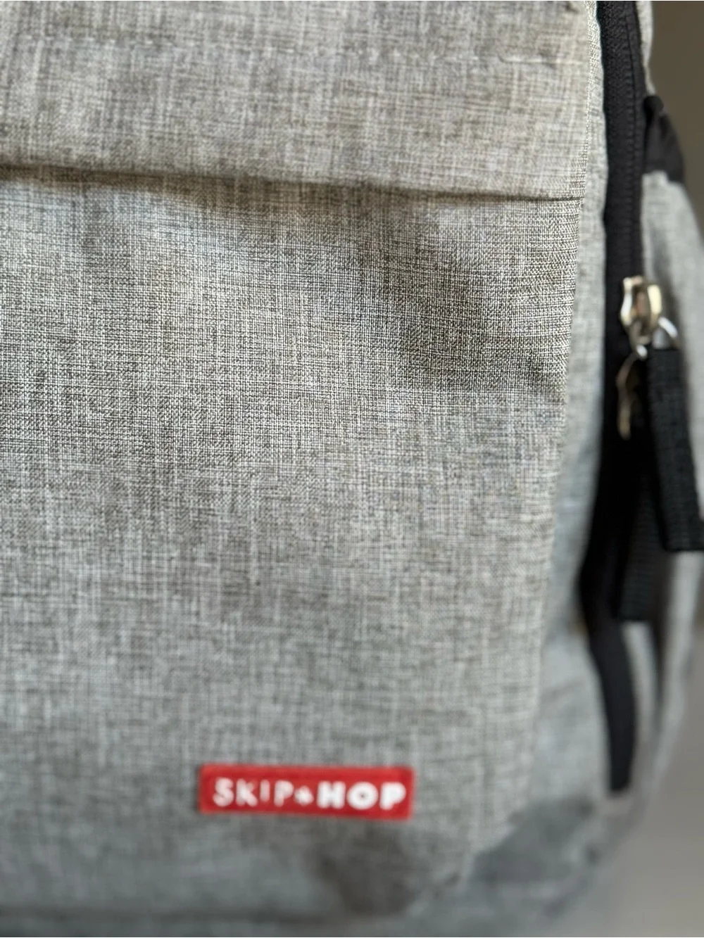 Skip Hop Light Gray Diaper Bag with Black Accents and Tan Trim